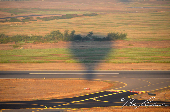 Balloon Shadow Crosses Runway