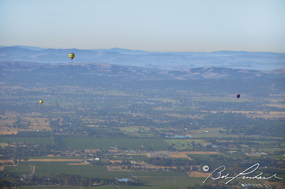 4634 Backlit Balloon Over Hazy Hills