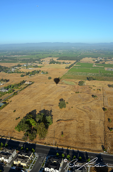 4634 Backlit Balloon Over Hazy Hills